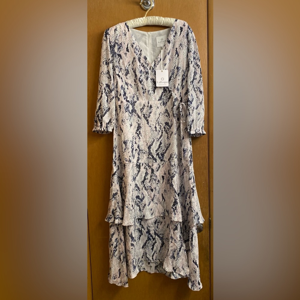 Dress up or dress down. Bought for a wedding and gained weight.